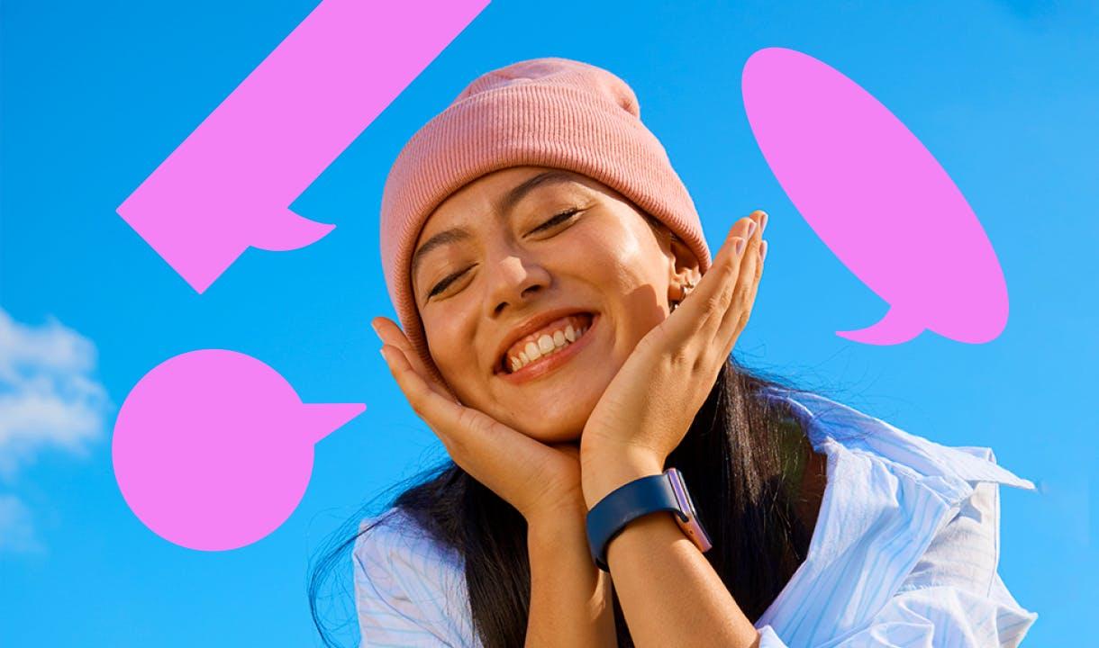 A girl with her face in her hands. Pink bubbles on a blue background