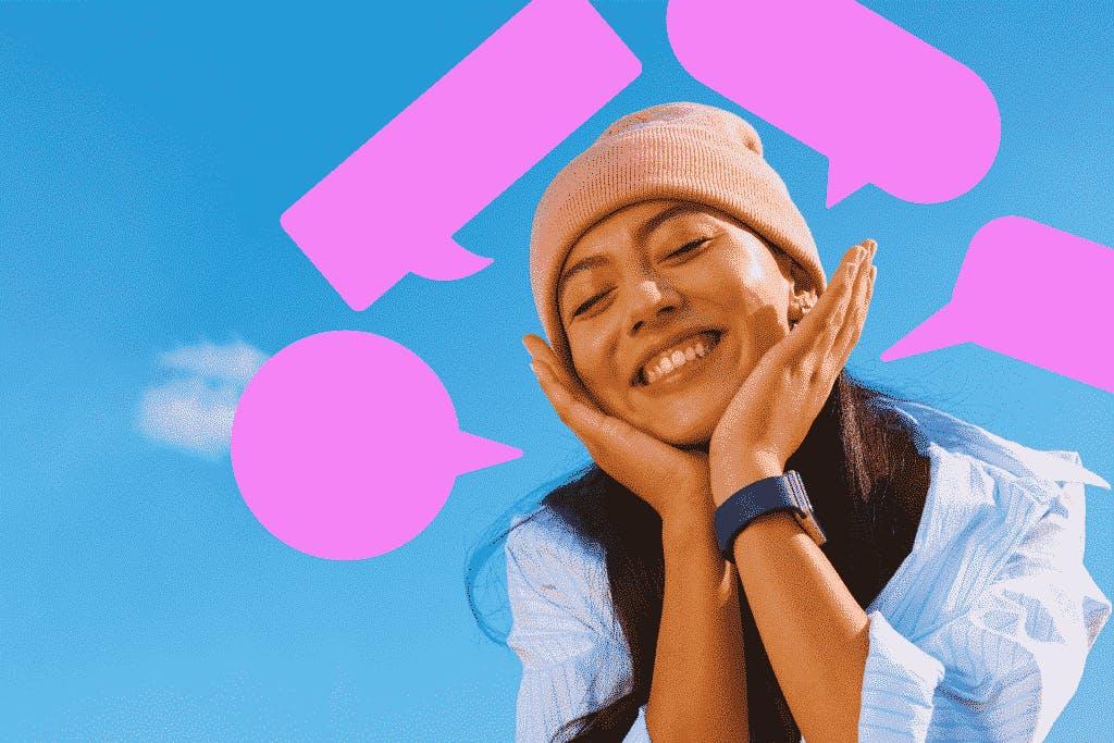 Een meisje met haar gezicht in haar handen. Roze bubbels op een blauwe achtergrond.